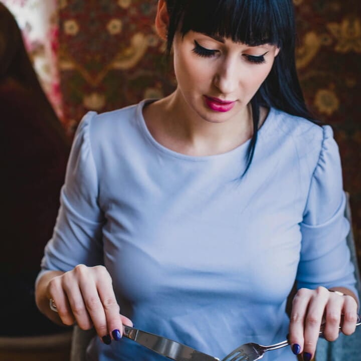 a girl eating a meal